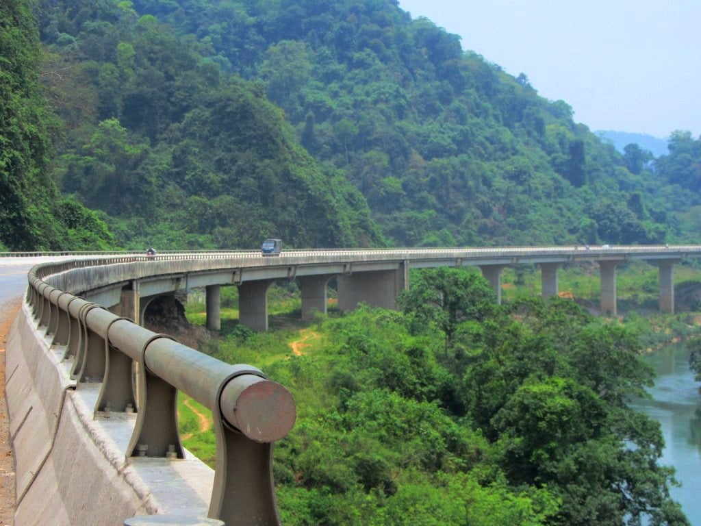 the Ho Chi Minh Road is elevated above jungles & rivers as it passes through Cuc Phuong