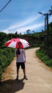 a morning stroll with an umbrella, under the beating sun