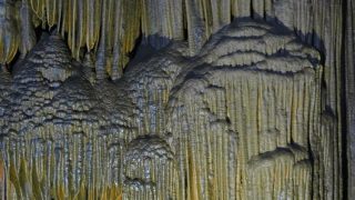 limestone cascades inside Lung Khuy Cave, North Vietnam