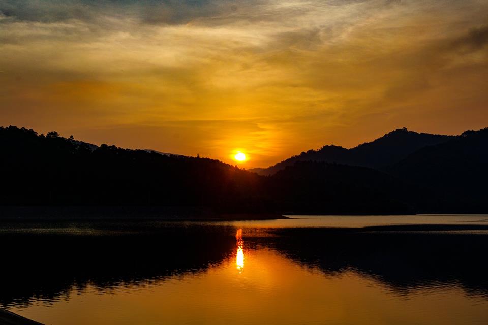 sunset over the lake by Ba Ao Waterfall
