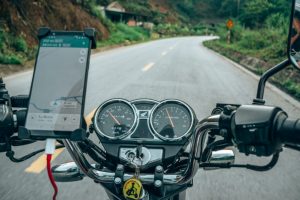 riding a Honda Master on the open road in North Vietnam