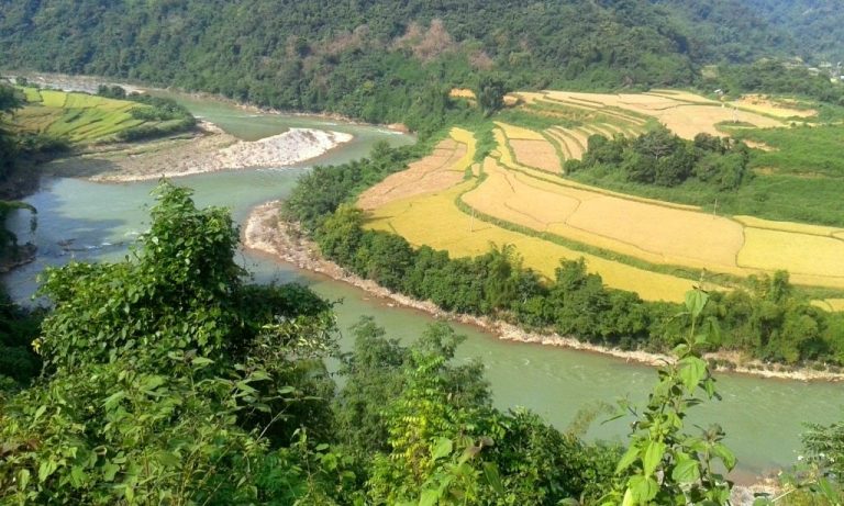 take the road to Bao Lac on the Gam River, and continue to the lusher landscapes of Cao Bang Province