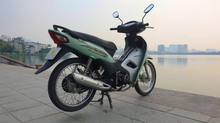 Vietnam Motorcycle Rentals: Honda Wave Alpha - back right angle