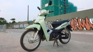 Vietnam Motorcycle Rentals: Honda Wave Alpha - front left angle