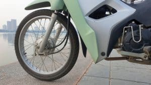 Vietnam Motorcycle Rentals: Honda Wave Alpha - front wheel