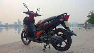 Vietnam Motorcycle Rentals: Yamaha Nouvo - back left angle