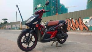 Vietnam Motorcycle Rentals: Yamaha Nouvo - front left angle