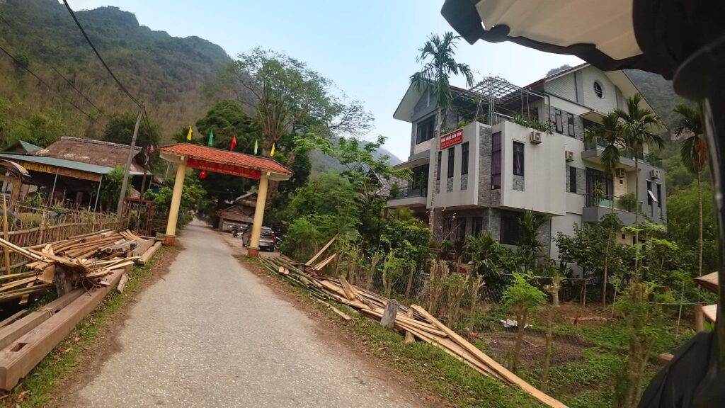 entering Mai Chau Town on a Honda XR