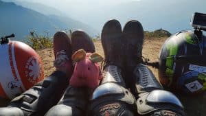 resting with our helmets on top of a mountain in North Vietnam