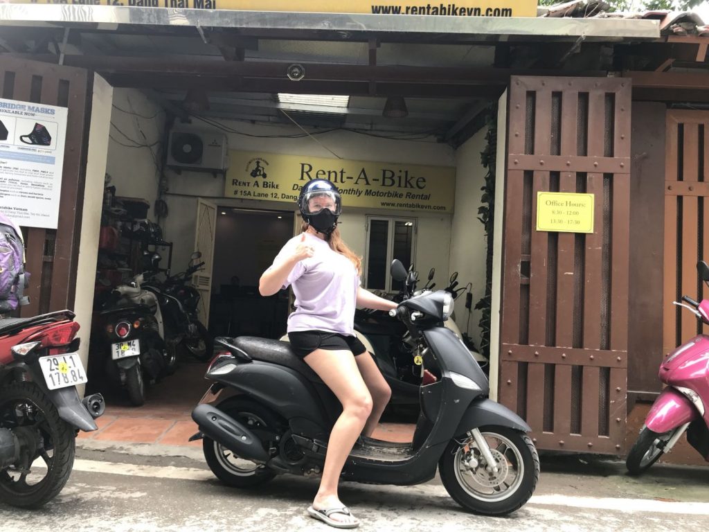 one of our customers taking a Yamaha Mio from our shop in hanoi
