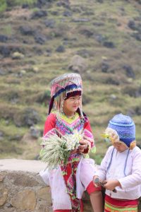 Young ethnic girl dressed up in traditional garb