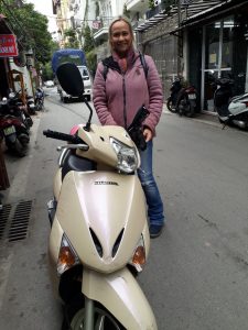 A happy customer ready to take here rentabike hanoi bike