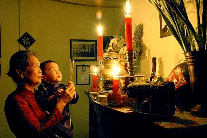 burning incense at the family altar