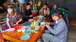 locals eating nem cuon in Bao Lac market, Ha Giang