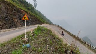 a sharp bend in the road in Lung, Tam Ha Giang