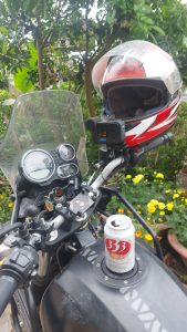 Royal Enfield on banana island with HJC helmet GoPro 10 and 333 beer