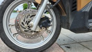 Vietnam Motorcycle Rentals: Honda Airblade - front wheel