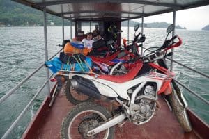 taking Honda CRF250s across the Hoa Binh Lake