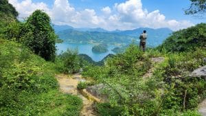 motorcyclist looking out over Hoa Binh Lake