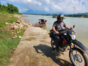 over the river on Rentabike Vietnam's Black River Loop Vietnam motorcycle tour