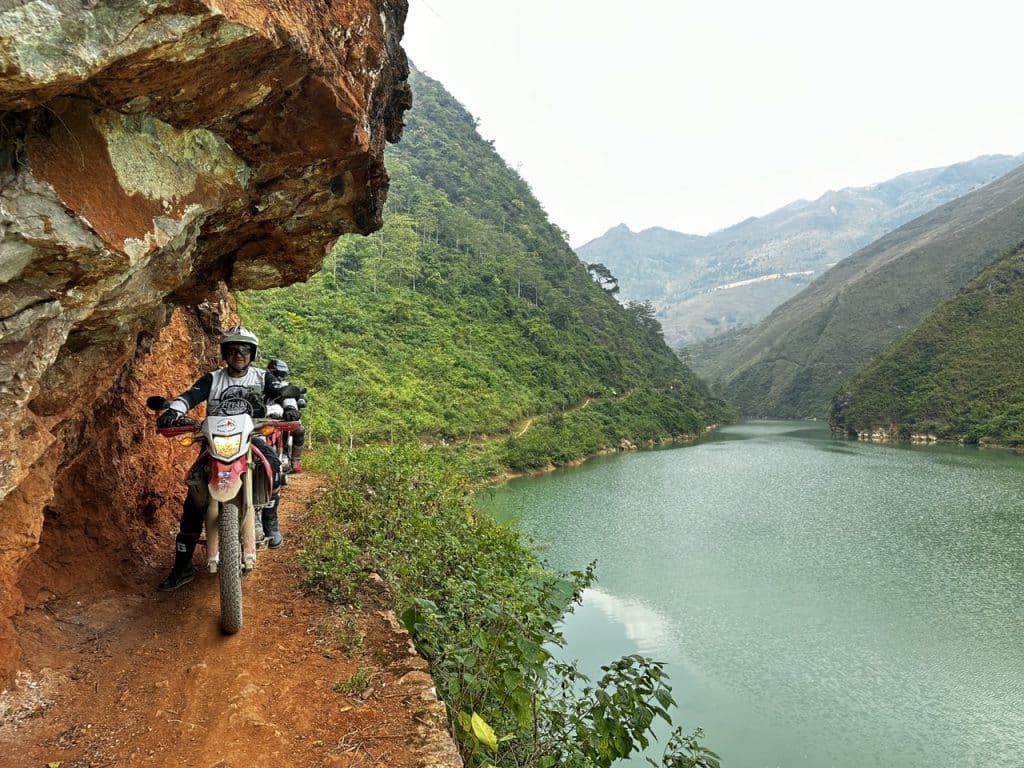 riders taking a sketchy road along the Ma Pi Leng Gorge in Ha Giang