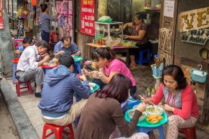 eating street food in vietnam is the norm