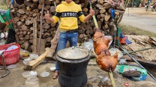 a local chef and a roasted pig