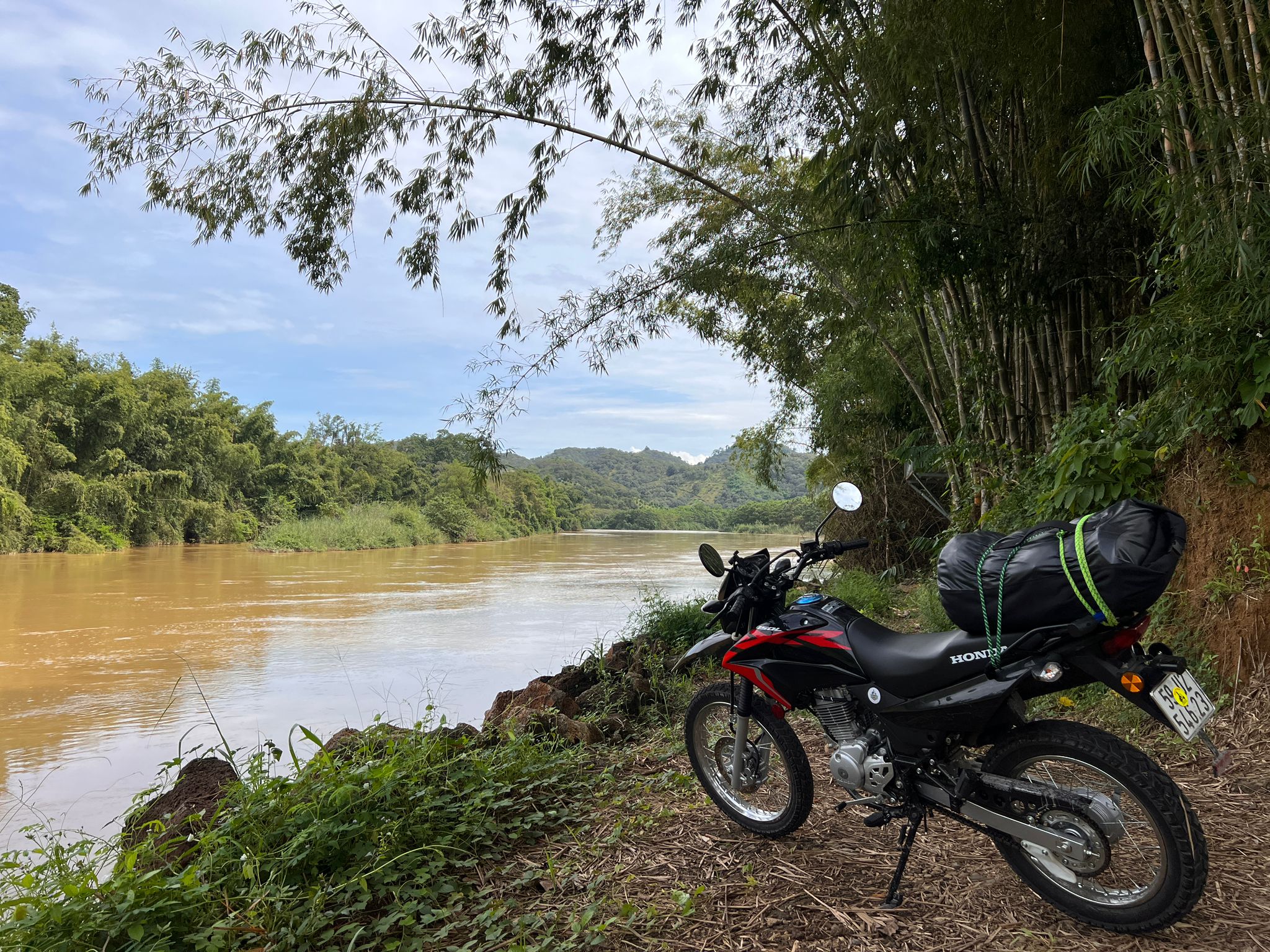 Honda XR150 parked by a river in northern Vietnam