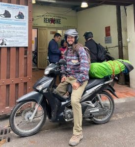 Rentabike customer before a two week motorcycle tour on a Honda scooter