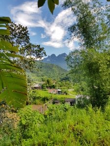 a sneaky view of a village in ha giang