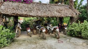 honda crf250 and xr150 parked at the homestay in vu linh thac ba
