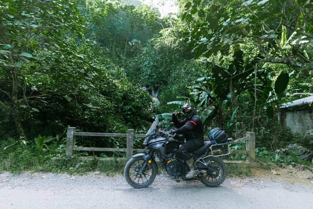 Danny near a waterfall in Hoa Binh