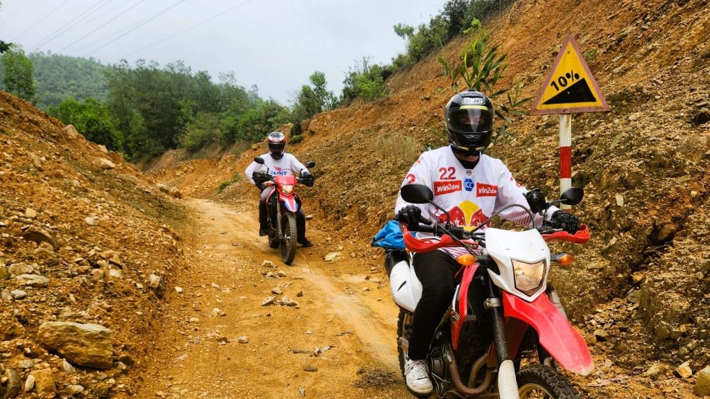 2 riders on crf250 bikes on the Black River Loop in Pu Luong Nature Reserve