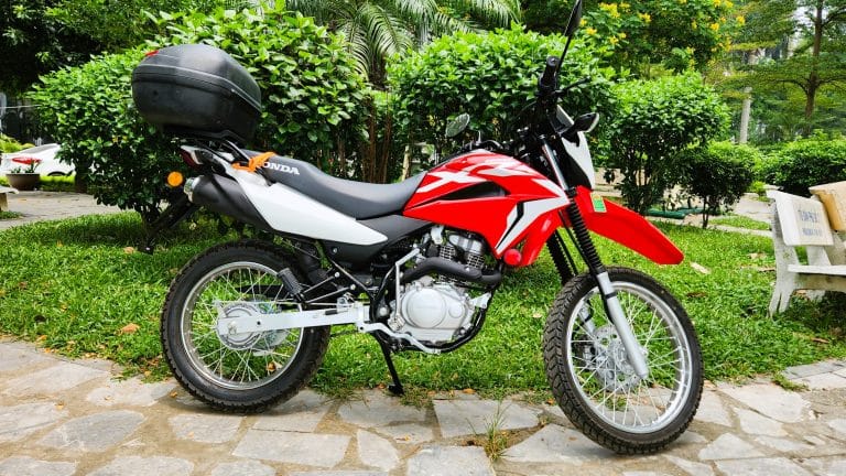 Honda XR150 in the park with GIVI top box