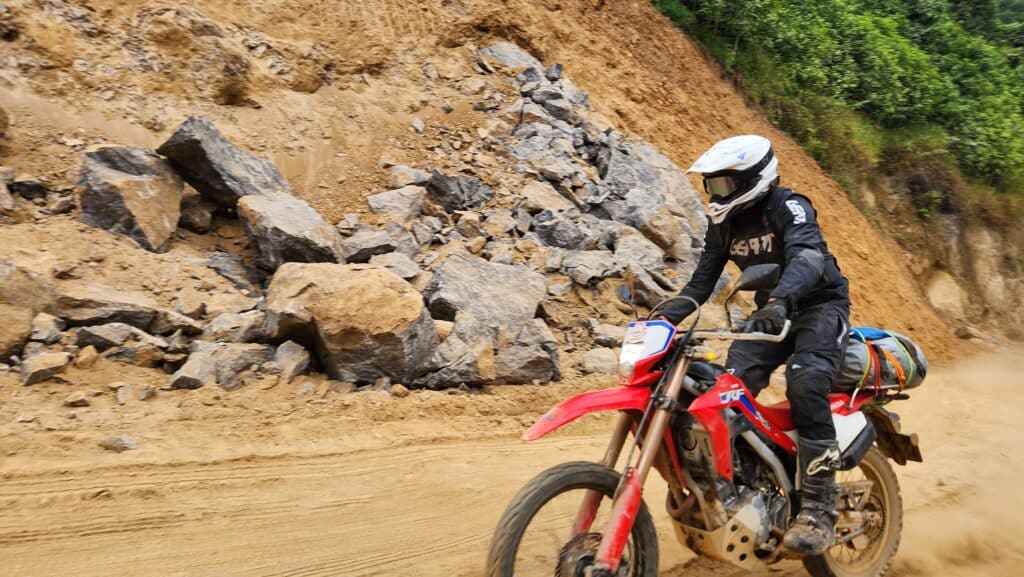 Tom racing through the dirt in Bac Kan province
