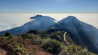 Ta Xua, Lu Tre Homestay – looking back at the concrete path to the ancient tea forest Ta Xua, Lu Tre Homestay - looking back at the concrete path to the ancient tea forest