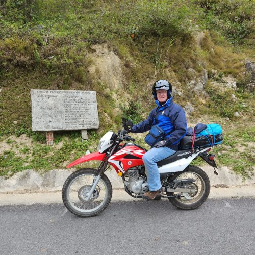 Paul Brooke and the Honda XR150 next to one of the old signposts in Xuan Truong