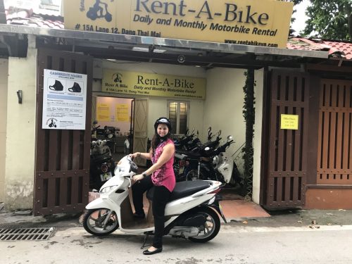 one of our customers taking a Honda Vision from our shop in hanoi