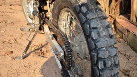 the chain of an XR150 in the mud