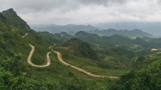 a winding mountain pass in Dong Van, North Vietnam a winding mountain pass in Dong Van, North Vietnam