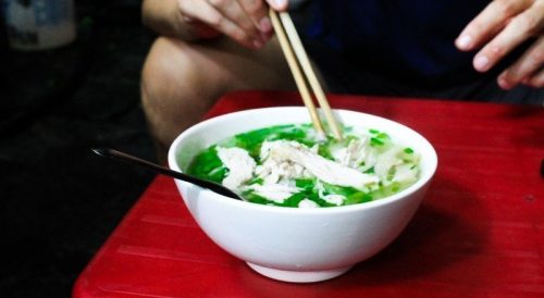 eating pho ga, Vietnamese chicken noodle soup