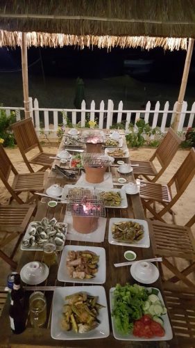 a delicious seafood spread at the Nhon Hai Beach Hostel restaurant