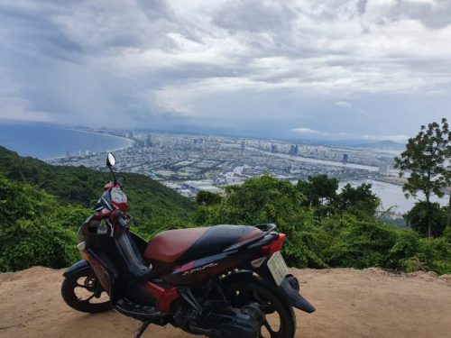 the view of the city on Son Tra, and a Yamaha Nuovo