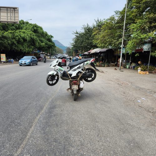 You will often see sights like a motorbike carrying another motorbike on the road in Vietnam