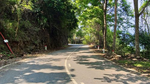 riding down Ba Be Road, near Ba Be Lake, on a sunny day riding down Ba Be Road, near Ba Be Lake, on a sunny day