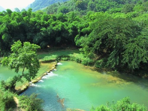 there are some excellent swimming spots on the river near Quang Duc Homestay